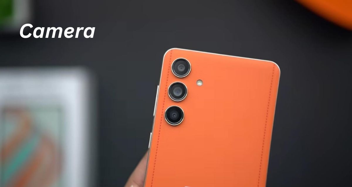 Close-up of triple-lens camera on a orange smartphone